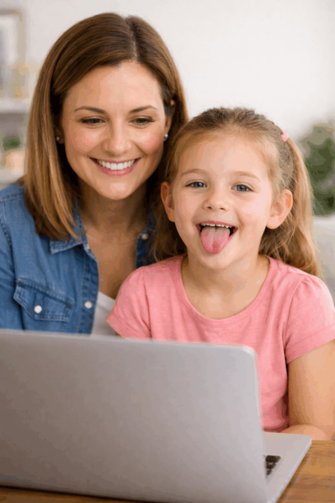 A young girl sticks out her tongue as part of the oral motor part of the telehealth speech assessment.